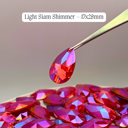 Light Siam Shimmer– 17x28mm AAAAA Glass Sew-On Teardrop Rhinestones (12-Count Tray)